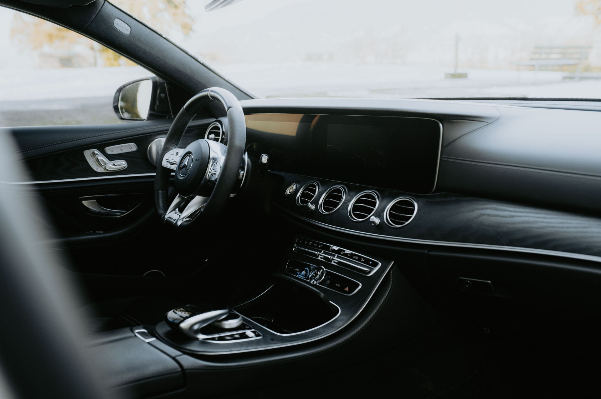 Clean Mercedes interior with leather seats and dashboard
